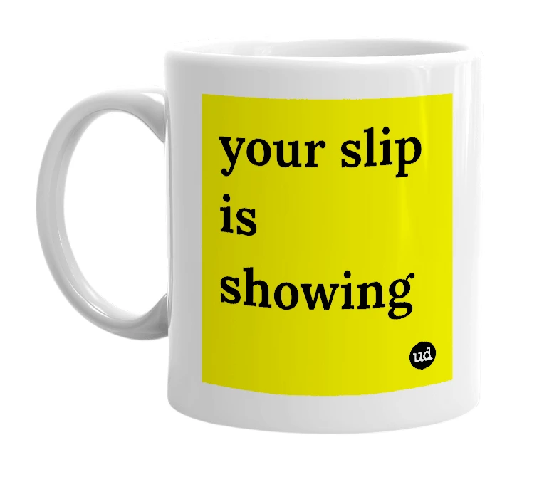 White mug with 'your slip is showing' in bold black letters