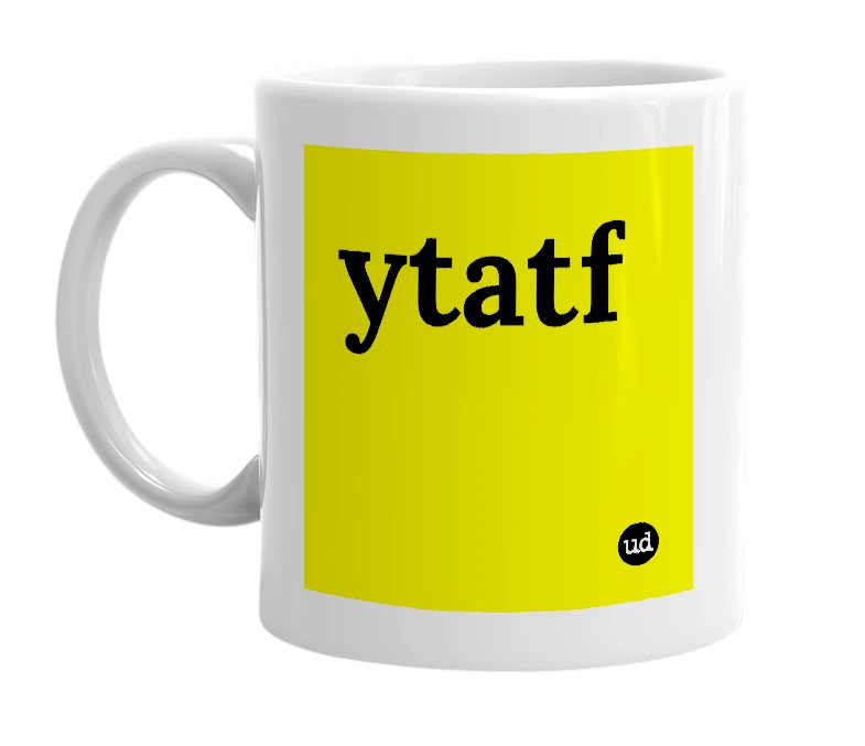 White mug with 'ytatf' in bold black letters