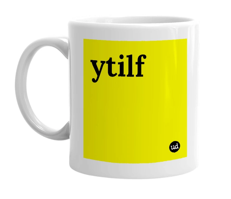 White mug with 'ytilf' in bold black letters