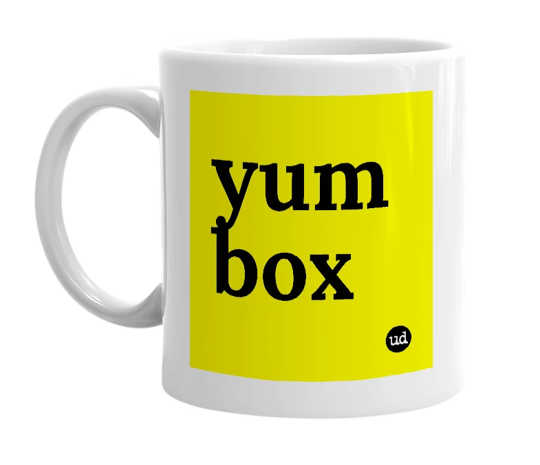 White mug with 'yum box' in bold black letters