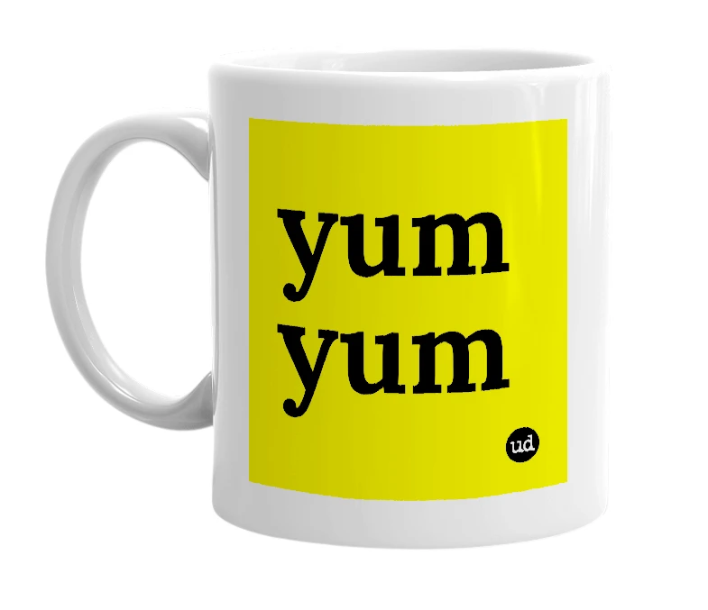 White mug with 'yum yum' in bold black letters