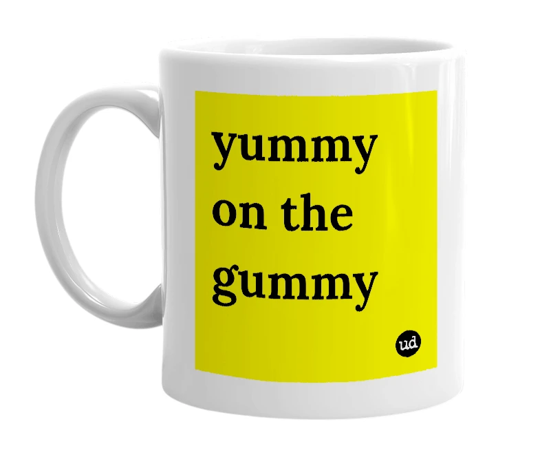 White mug with 'yummy on the gummy' in bold black letters