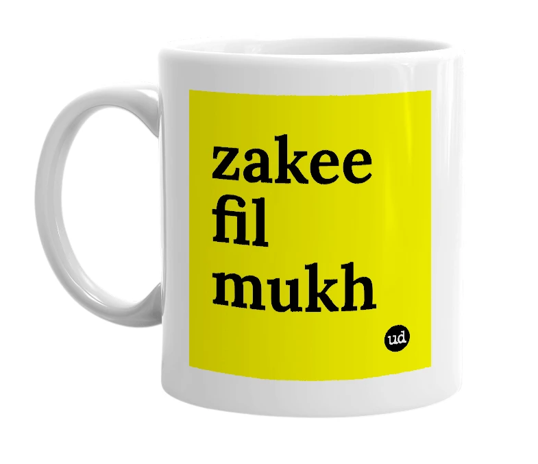 White mug with 'zakee fil mukh' in bold black letters