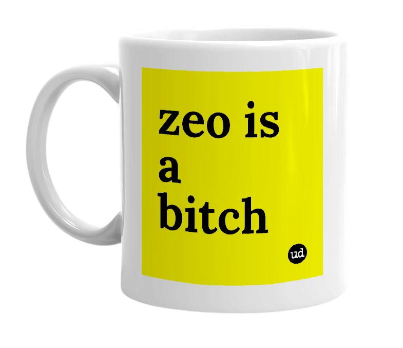 White mug with 'zeo is a bitch' in bold black letters