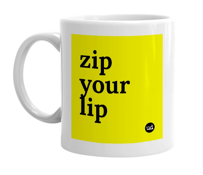 White mug with 'zip your lip' in bold black letters