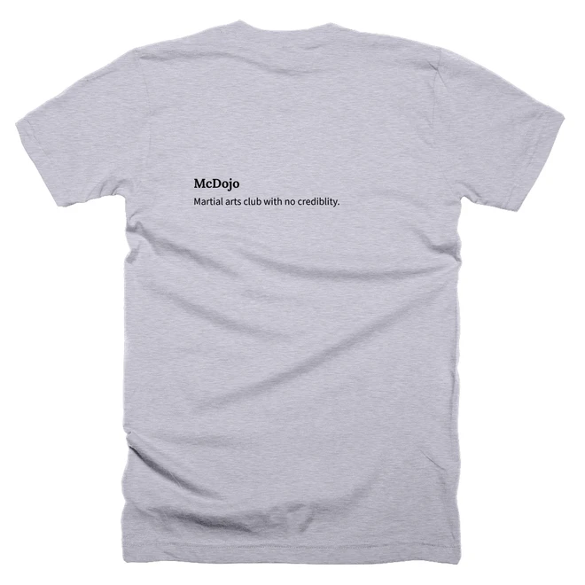 T-shirt with a definition of 'McDojo' printed on the back