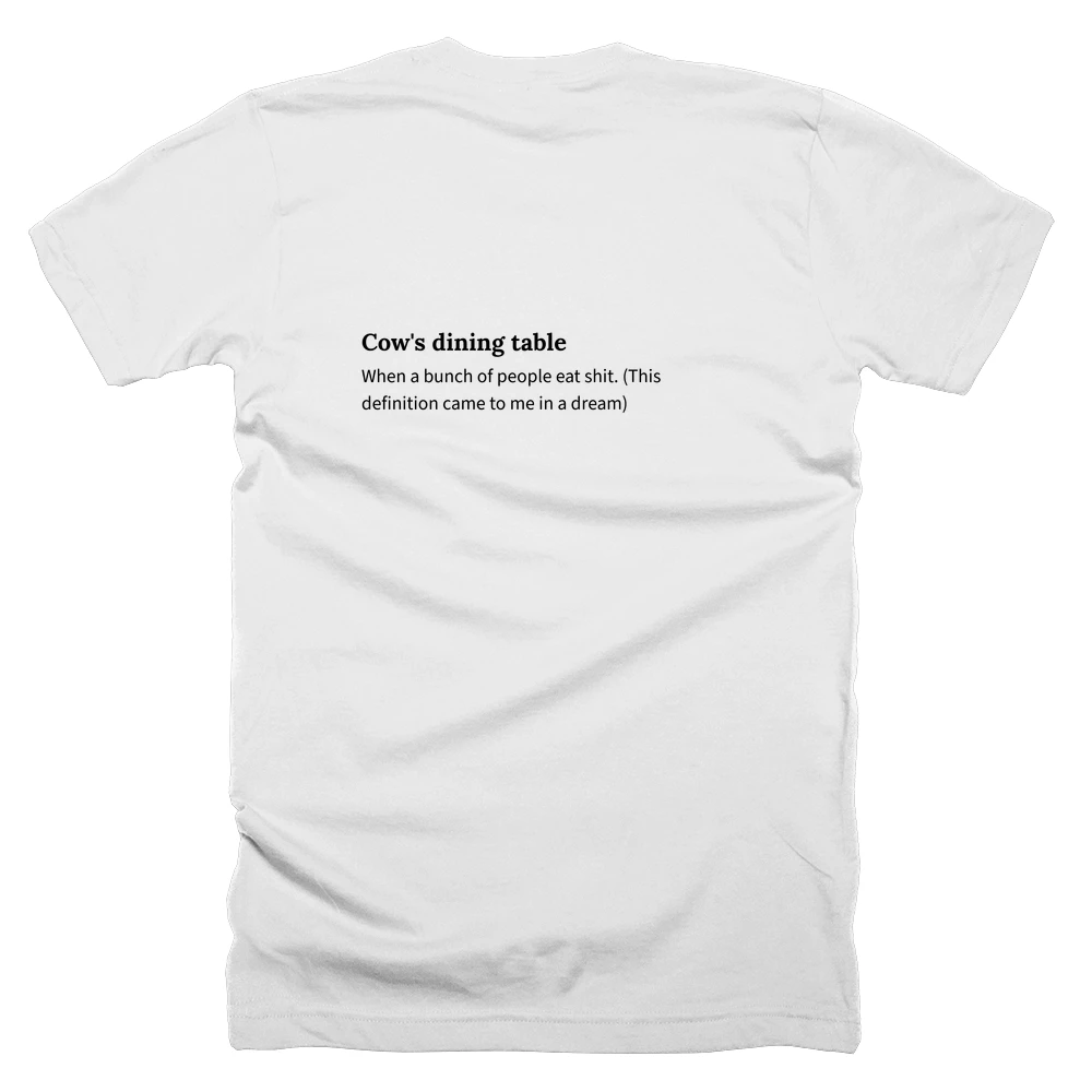 T-shirt with a definition of 'Cow's dining table' printed on the back